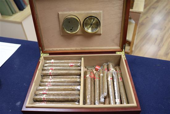 A humidor containing cigars